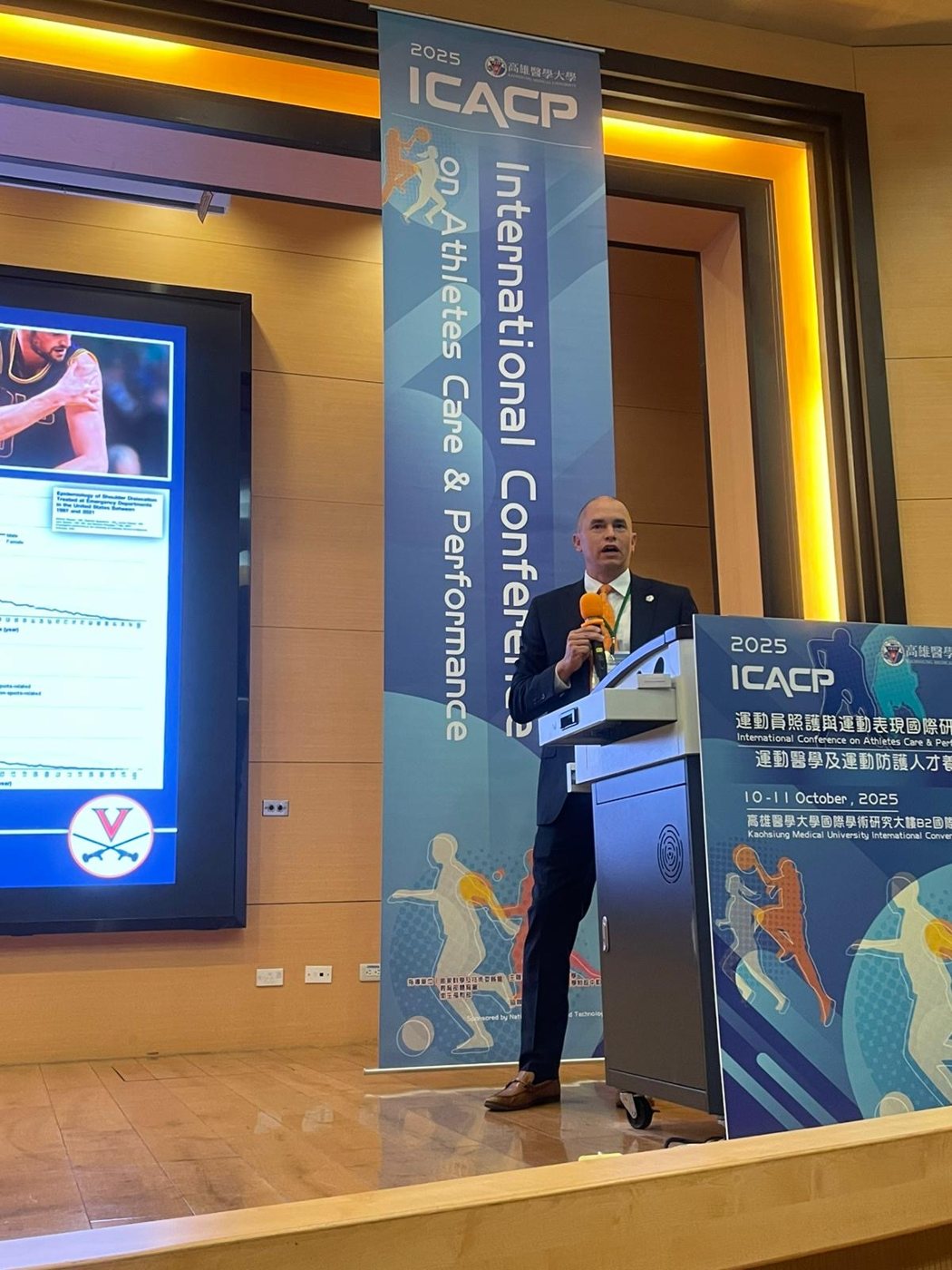 Dr. Gwathmey lecturing at an international sports medicine meeting in Taiwan